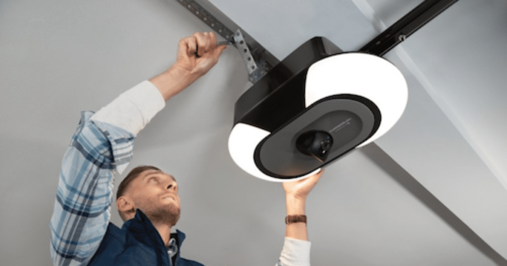 Securing garage opener to ceiling mount.