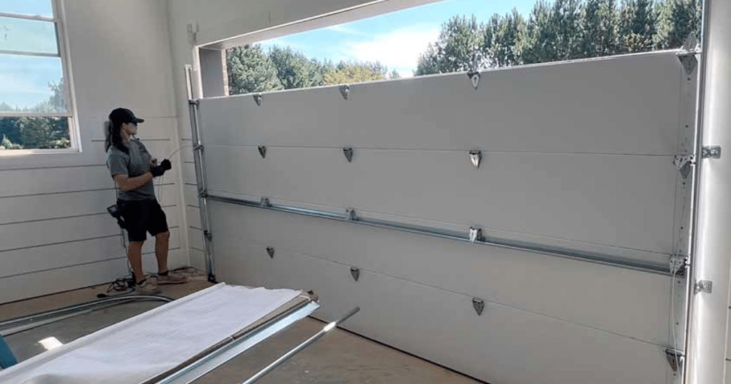 How much to replace garage door panels?
