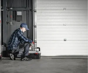 expert repairing garage door